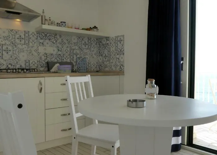 Hotel apartamentowy Le Tolde Del Corallone