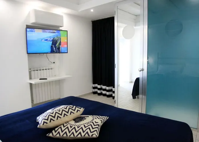 Hotel apartamentowy Le Tolde Del Corallone 4*