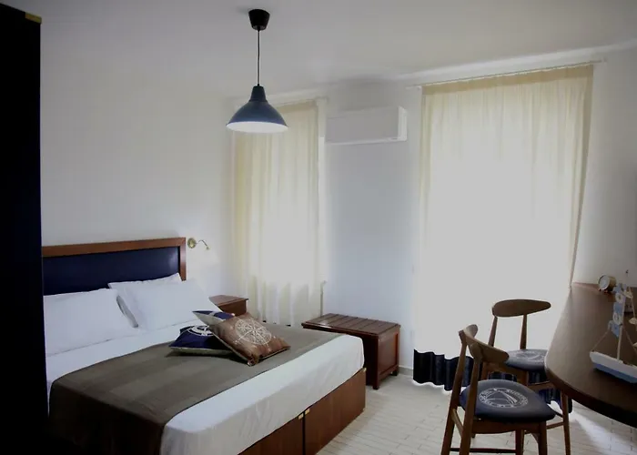 Hotel apartamentowy Le Tolde Del Corallone 4*