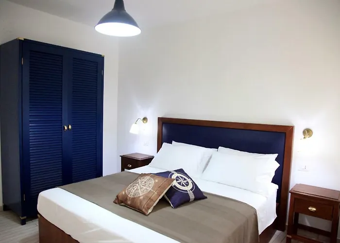 Hotel apartamentowy Le Tolde Del Corallone 4*